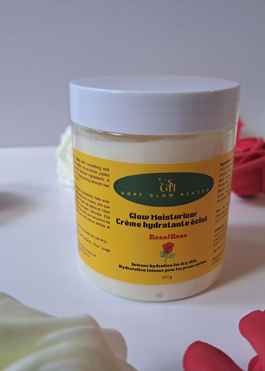Hydrating skin cream with shea butter in a jar with a yellow label among roses.