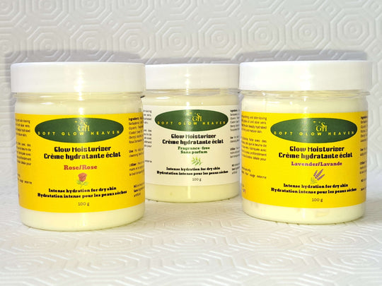 Hydrating skin cream with shea butter in clear jars, showcasing Glow Moisturizer Hydrating with rose and lavender scents.