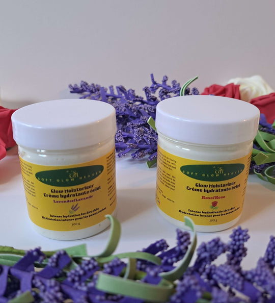 Glow Moisturizer Hydrating Skin Cream Travel Size jars displayed with lavender flowers and colorful ribbons.